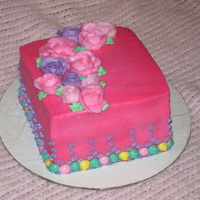 Pink Birthday Cake This is my first attempt at really decorating a cake. It was for my daughter's 3rd Birthday. Strawberry cake with BC. Later I put...