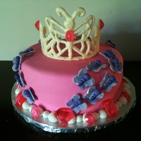 Pink And Purple Butterfly Princess Cake Done for a 2 year old's birthday, who loves pink, purple, butterflies, and was having a princess party. Cake is covered in fondant,...