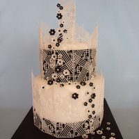 Black And White 2 Tier I wanted to bring the old style piping/extension work into the 21st century with this geometric design. I was really happy with the result...