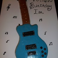 Guitar This cake was made of fondant (yellow cake)