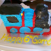 Thomas Cake Made with the Wilton ChooChoo Train cake pan, and their BC recipe, tinted with royal blue, no-taste and Christmas Reds, lemon yellow and...