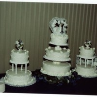 White Wedding Cake white wedding cake, all buttercreme vanilla icing, white royal frosting roses