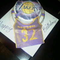 Lakers Birthday Cake Two tier vanilla with raspberry filling and triple chocolate chip frosting wrapped in MMF