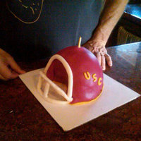 Usc Football First time I have ever made a helmet or any 3D cake to say the least. Had a blast making this though. Vanilla cake with whipped cream...