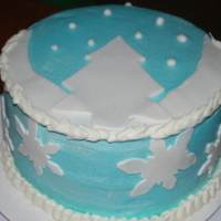 Wasc Cake With Fondant Snow Flakes And Christmas Tree This is a simple cake I threw together. It is WASC with fondant accents and vanilla buttercream.
