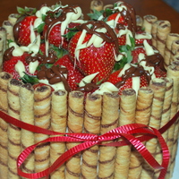 Strawberry Barrel Cake WASC cake made for a friends birthday. Surrounded by pirouette cookies.