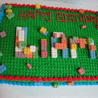 Lego Cake Chocolate cake filled with ganache and iced with buttercream. After the buttercream crusted, I used my daughter's lego board to...