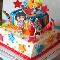 Dora And Boots Cake Colorful Dora the Explorer and Boots cake for a 1 and 3 yr old birthday. 8" square WASC with strawberrry cream topped with a 4"...