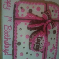 Pink & Brown 1St Bday Cake Client wanted a cake with pink/brown polka dots for her daughter's 1st bday cake. From there I suggested the stripes on the side, and...