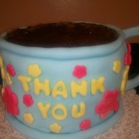 Coffee Cup I found this on the Wilton website. It's 2 6" cakes with MMF. The handle is held on with lollipop sticks, if I did it again I...