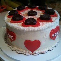 Valentine Cake Cherry chip for top & bottom. The middle is the sour cream white cake out of The Cake Mix doctor. MMF hearts, York Peppermint Patty...