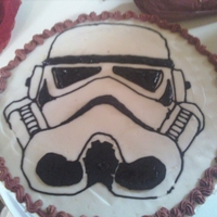 Storm Trooper Printed the template, traced with royal frosting, piped with chocolate buttercream that I tried to color red.