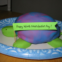 Turtle Birthday Mini Cake First time ever to cover a cake with fondant. A "mini" cake for daughter's friend's birthday. Shell is half-dome cake...