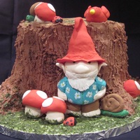 Gnome Tree Stump Birthday Cake Buttercream tree stump with fondant figures. Gnome modeled after my dad (roughly) because he always wears hawaiian shirts. Chocolate cake...