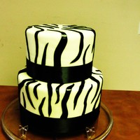 Elegant Zebra Cake This cake was made with fondant and I added a black ribbon for a perfect look.
