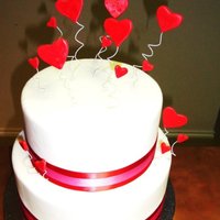 Valentine's Day Cake With Hearts I used fondant to cover the cake and for the hearts.