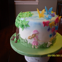 Spring Day Idea from CakeCentral Magazine. Made for my daughter's school auction. Everything is edible and made from MMF