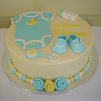Baby Shower For Baby Boy Buttercream with hand sculpted fondant accents.