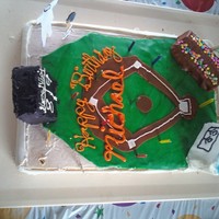 Baseball Cake This was my first time trying to use fondant on a cake by myself.. it was for a friends little boys 9th birthday.. hence the score board...