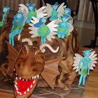 Blue Faries Visit Trapped Woodland Dragon grad cake for next day still has supports visable untill dried but will be covered by gumpaste leaves in morning before party.