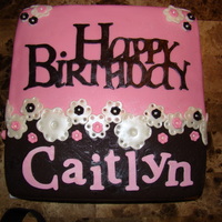 Pink & Brown Flower Cake 2 layer chocolate cake with chocolate ganache/fresh raspberry filling and covered in pink and brown fondant. A paisley impression mat was...