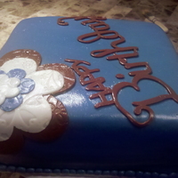 Denim Blue And Flowers Birthday This is Chocolate cake with denim blue fondant, vanilla and chocolate fondant accents. Flowers were imprinted with imprint mats, flowers...