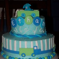 1St Birthday Marshmallow Icing with MMF accents/figure. I made this for my sons 1st Birthday. I tried to incorporate all of the things he likes. Trucks...