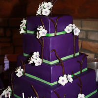 Purple Cherry Blossom Cake Wedding cake with alternating size tiers. Bottom tier is blue velvet to reveal sex of couples baby. I was the only person to know. It was...