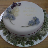 Birthday Cake With Crystallised Sweet Peas A cake for a lady with very specific tastest. She grew the flowers in her garden and I had to collect them and crystallise them for the...