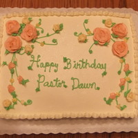 Buttercream Roses Birthday Cake Peach Roses, Ivory miniature roses, and yellow drop flowers compliment this flower themed birthday cake.