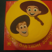 Toy Story Woody and Jessy cake for a 4 year old girl. Characters cut out of fondant, but everything else is buttercream.