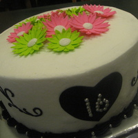 Sweet 16 I had a girl send me a picture of a cake she wanted for her birthday except with dasies on top. The picture happened to be from here so...