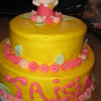 Tinkerbell Birthday Cake Having difficulty smoothing out the edges of the cakes. Other than the edges, I'm pretty happy with it.