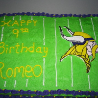 Minnesota Vikings Cake Half vanilla, half chocolate with buttercream filling and buttercream icing. Viking head was my first attempt at Frozen buttercream...