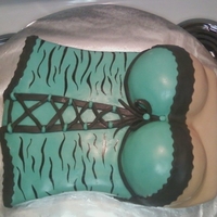 Corset Cake 1st time making a corset cake. Homemade MMF and flavored it with white chocolate.