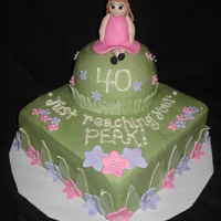 Over The Hill Cake I wanted to make this a little happier than the normal "over the hill" cake. Figure is gumpaste. All decorations are fondant.