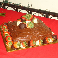 Strawberry Grooms Cake The cake is marble cake with our family fudge filling and frosting. Chocolate covered strawberries for decorations. Had many compliments...