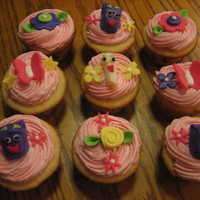 Dora The Explorer Cupcakes I was asked to make cupcakes for a little girl's 4th birthday. She loves butterflies and flowers but her mother also wanted to have a...