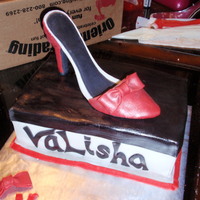 Stiletto Shoe Cake Fondant shoe on top of a fondant covered cake shoe box. Made for the owner of the shoe company.