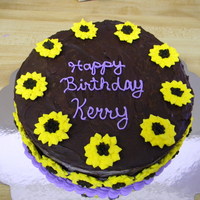 Mother-In-Laws B-Day Chocolate cake with chocolate ganache and royal icing sunflowers.