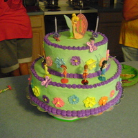 Tinkerbell Cake - 3Rd Birthday Butter cream frosted, two tiered, stacked cake. All the flowers and the 2 butterflies were done in royal icing because I thought the kids...