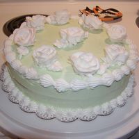 Boss's Birthday Cake I made this cake for my boss. I'm still practicing the Wilton rose!