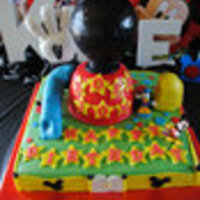Mickey Mouse Clubhouse chocolate and red velvet cake covered with marshmallow fondant; Head and foot made out of rice krispy cereal.
