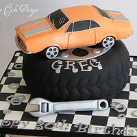 '67 Chevy Camaro Car made from RKT, tire is cake and details are all gumpaste. Completely edible. =)