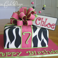 Zebra Present Cake These are SO fun to make... the bow takes a couple of hours to do though. =pCompletely edible other than the wires.
