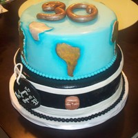 Map Cake The map is hand painted. The cake is french vanilla with buttercream filling. Covered in fondant. It was a gift to my cousins new boyfriend...