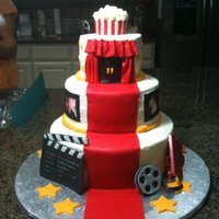 40Th Birthday This was for my brother's 40th birthday. He owns a production company, that's why I chose this design. I iced it with buttercream...