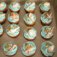 Seashell Cupcakes Seashell cupcakes for a school bakesale. Banana chocolate chip cakes with buttercream icing. Marshmallow fondant shells and brown sugar...