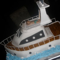 Azimut Yacht Carrot cake with cream-cheese cinnamon frosting modelled after my friend's boat- gumpaste figurine