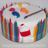 Art And Craft Chocolate mud cake filled with chocolate butter cream, covered in fondant, decorated in hand made fondant crayons, paint tubes, paintbrush...